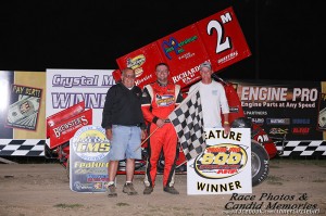 Dustin Daggett in victory lane at Crystal Motor Speedway. - Jennifer Peterson Photo