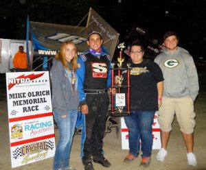 Ryan with Olrich family and trophy