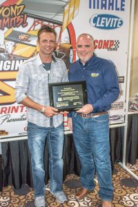 2016-engine-builder-scott-gressman-engine-pro-rep-dain-naida-in-front-of-banner